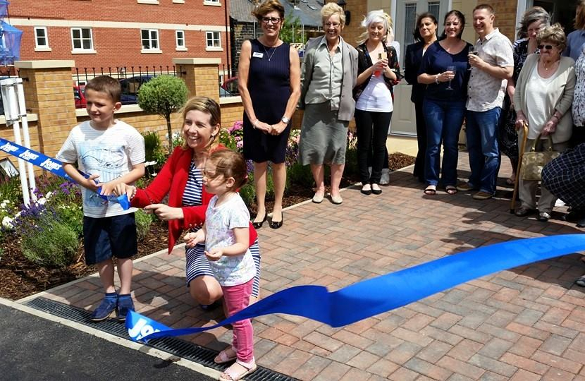 Andrea cuts the ribbon